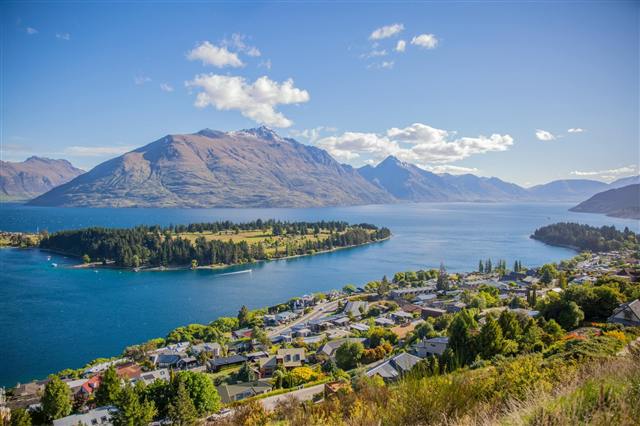 New Zealand lakeside city with mountain landscape