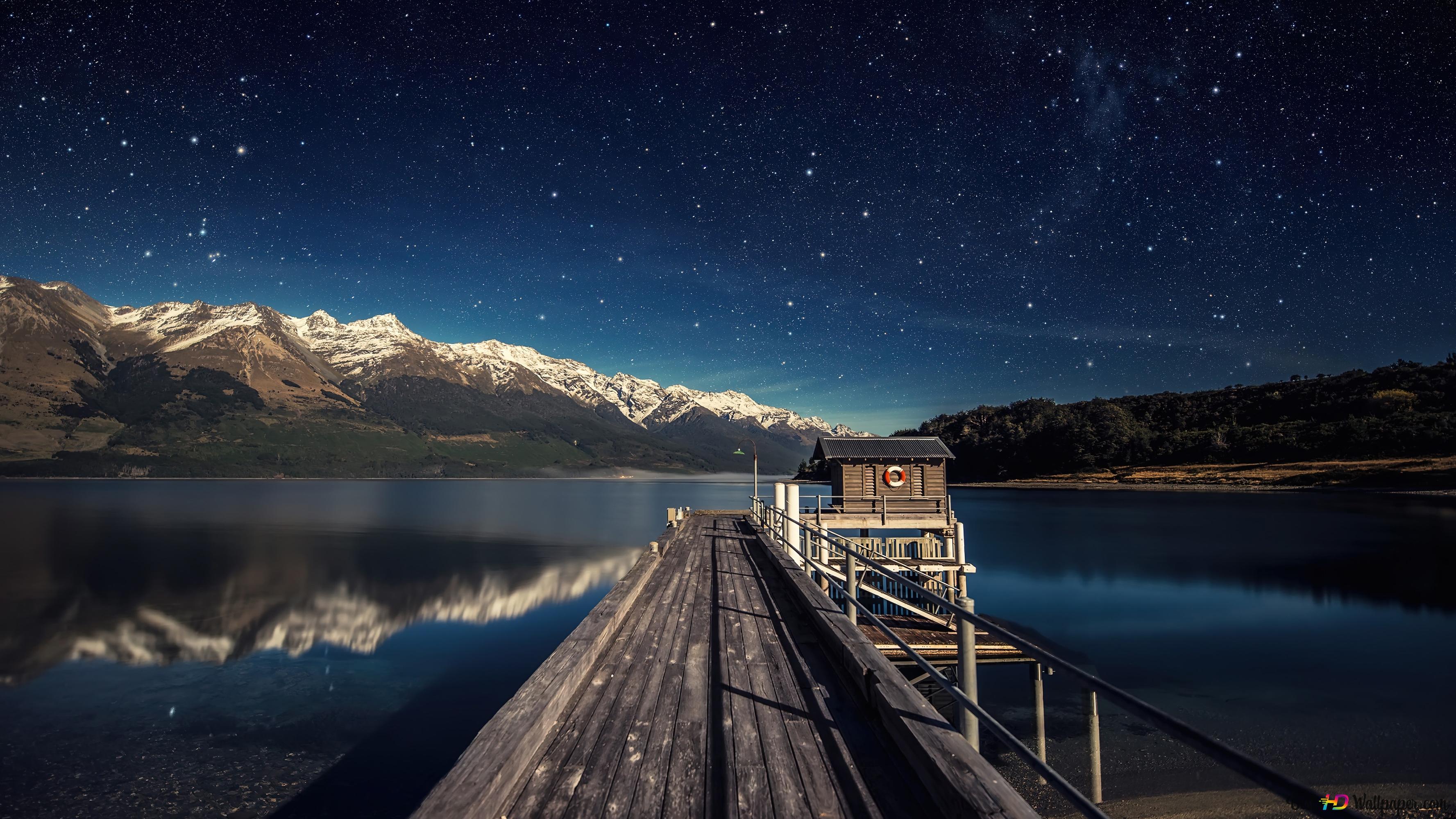 New Zealand lake, bridge and mountains at night